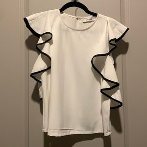 White with black trim. Size Snall